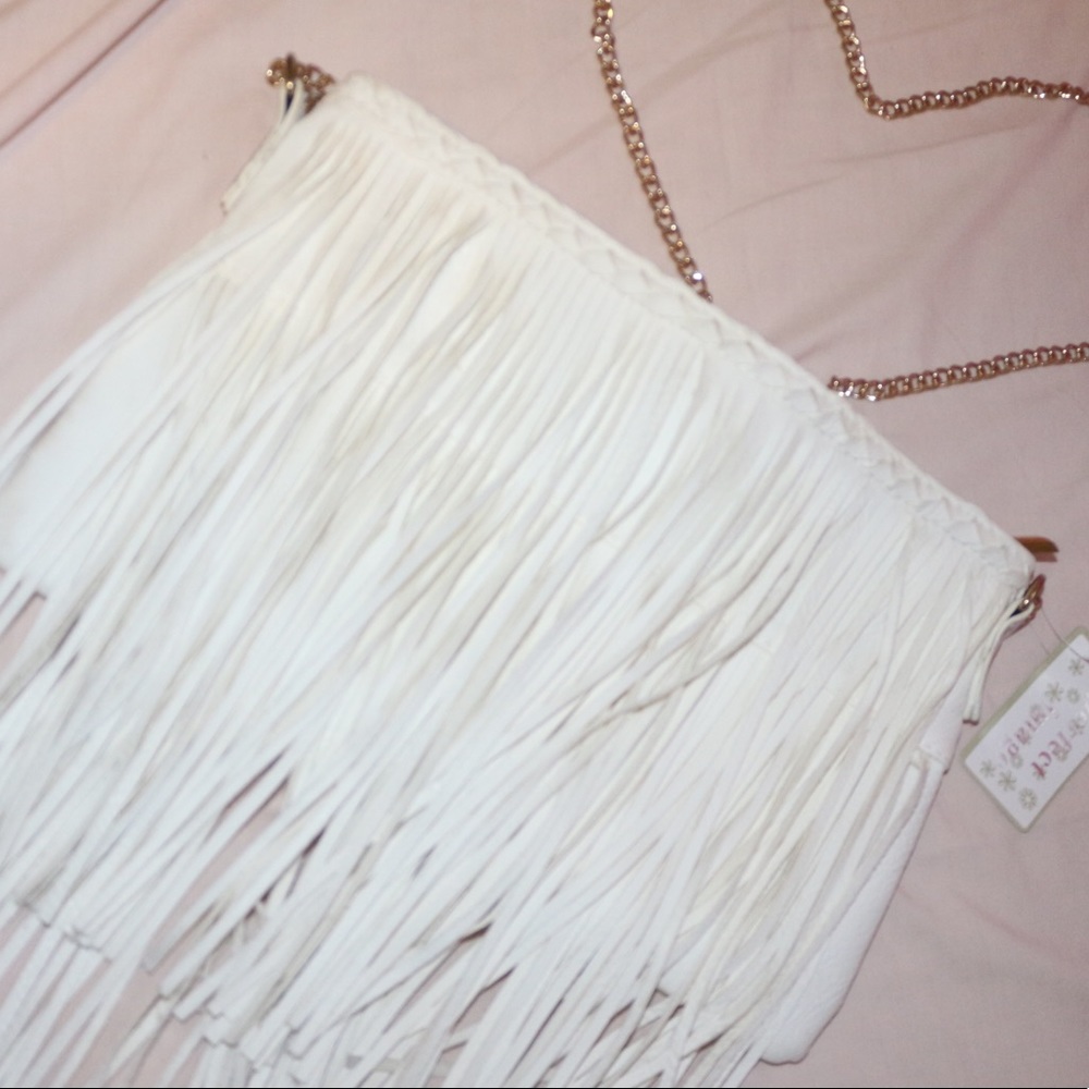 Fringed white crossbody purse